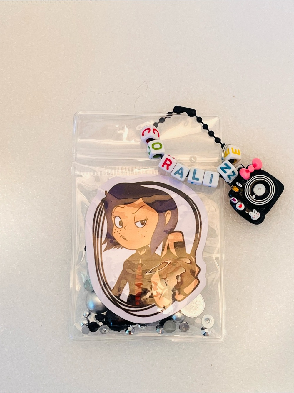 Hand Crafted Resin Coraline Phone Case with Black Accents - Picture 5 of 10